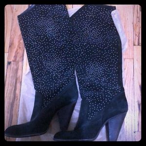 Suede black boots with gold studs.